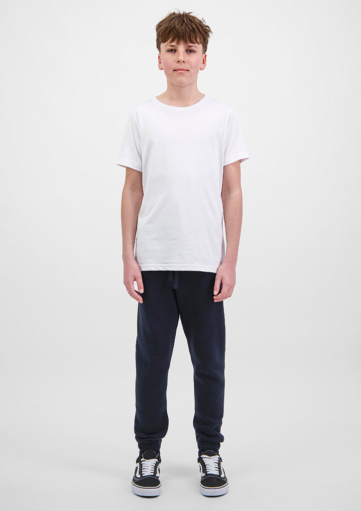 Basis Youth Track Pant - X1004Y in Navy - model